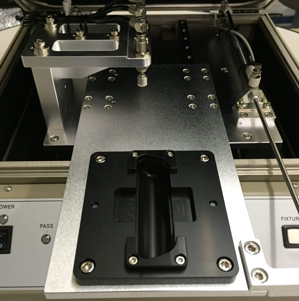 Pnuematic custom test fixture button press